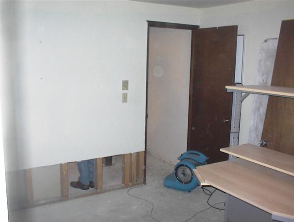 The wall to the bathroom, removed