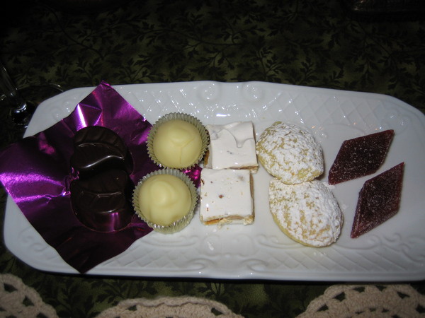 A Selection of Small Treats (Raspberry gel, orange-thyme madeleine, nougat, lemon-geranium white chocolate truffle, lavender dark chocolate truffle); 1864 Blandy's Gran Cama De Lobos Madeira